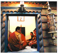 Tibetan monks blessing the tower